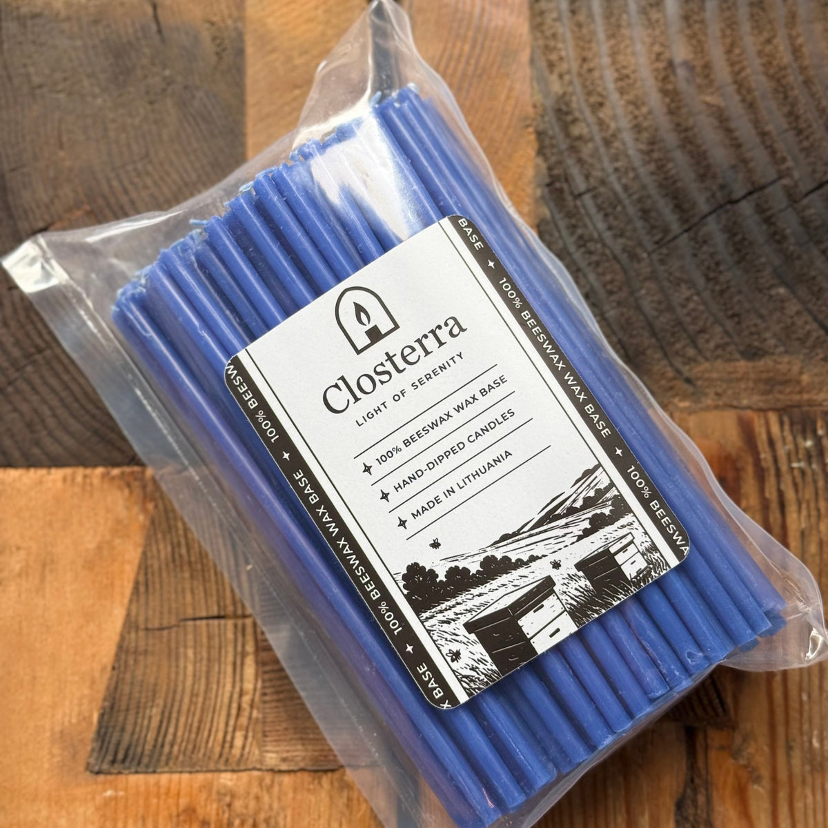 Blue beeswax taper candles 6.3″, closterra packaging flat lay