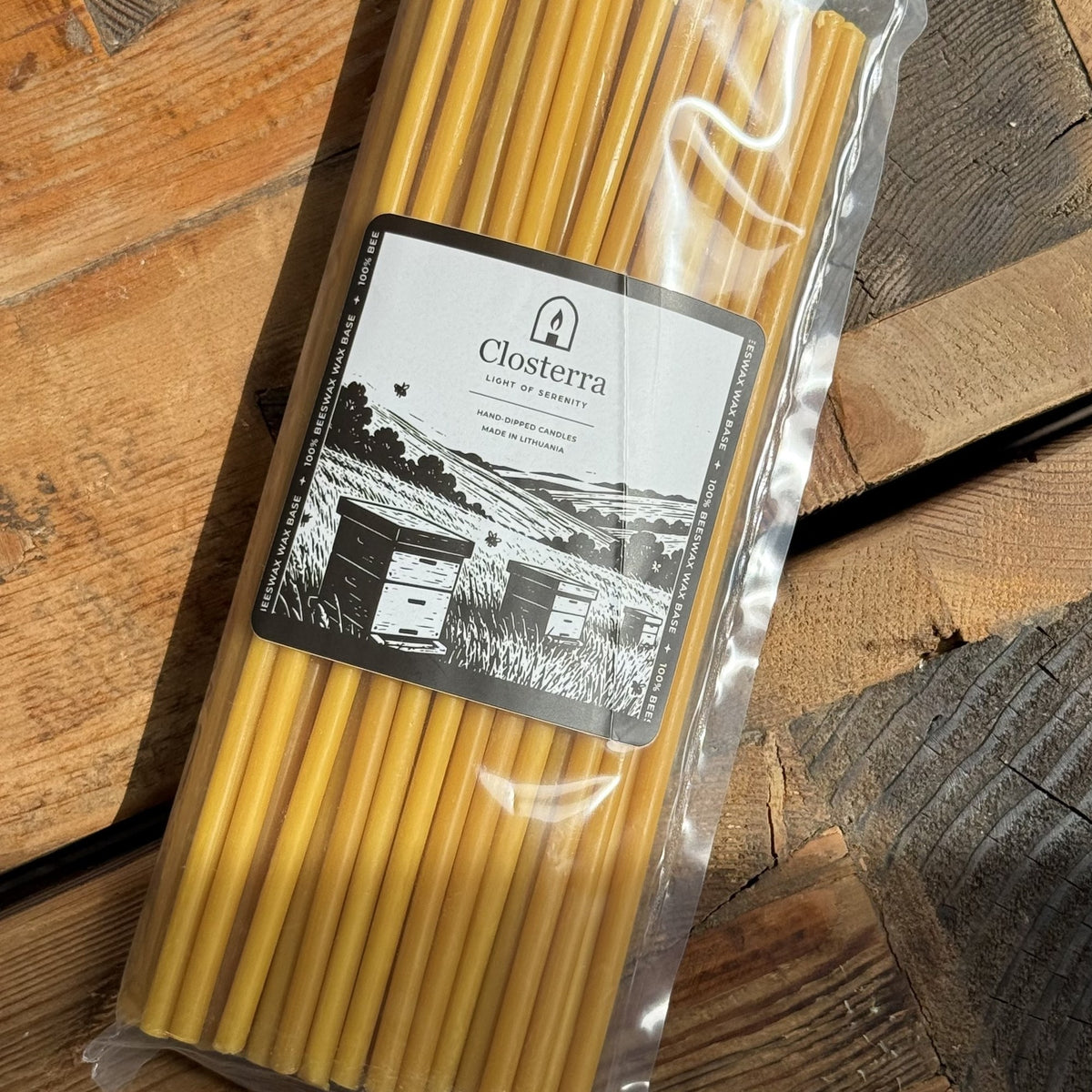 Natural yellow beeswax taper candles 10.4″, pack of 50 in Closterra packaging