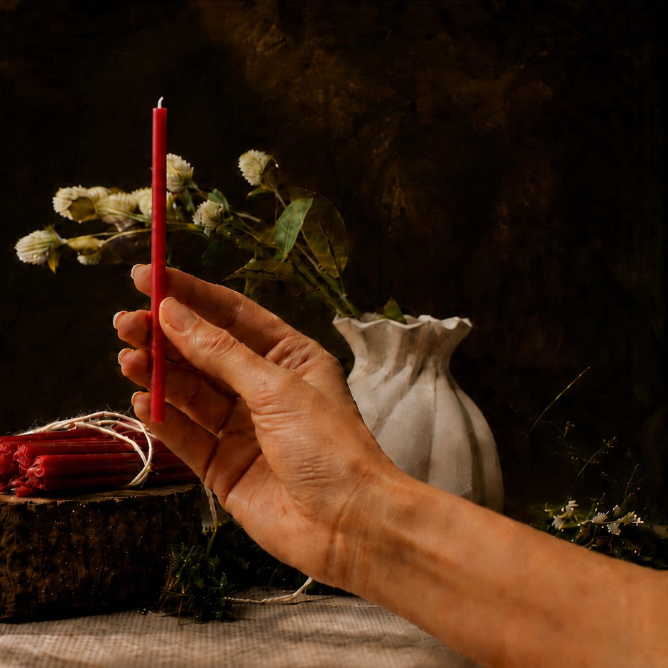 Red thin beeswax taper candle held in hand, 6.5 inch, Closterra