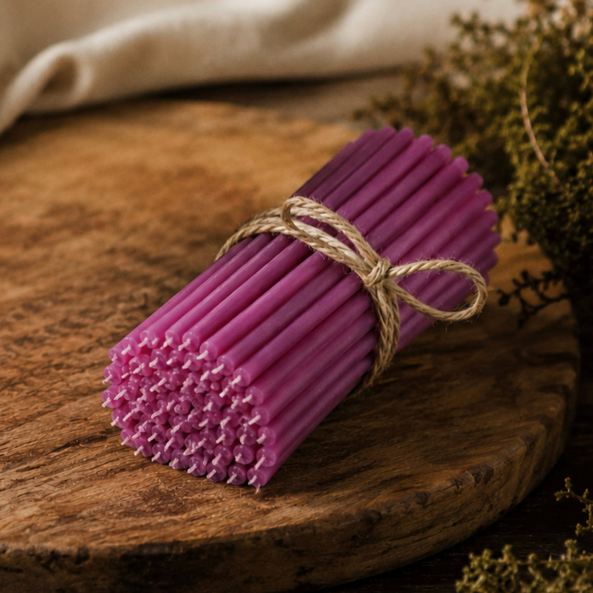 Purple thin beeswax taper candles by Closterra