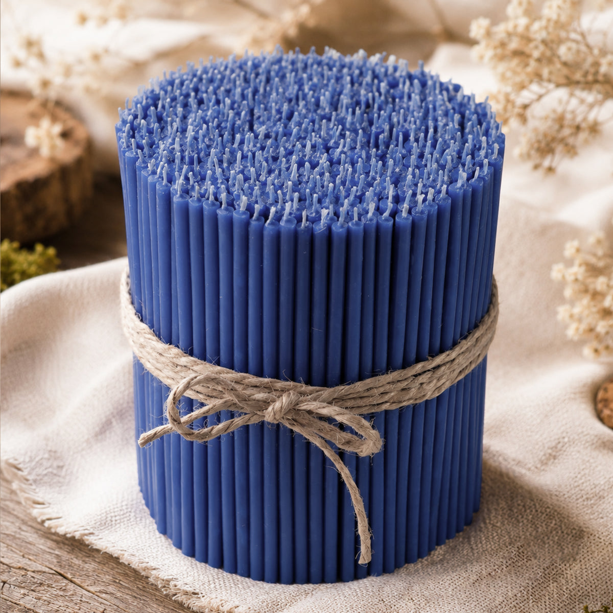 Blue thin beeswax taper candles by Closterra