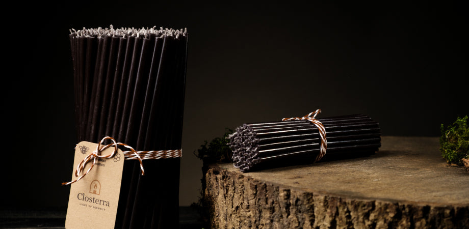 Black beeswax taper candles by Closterra