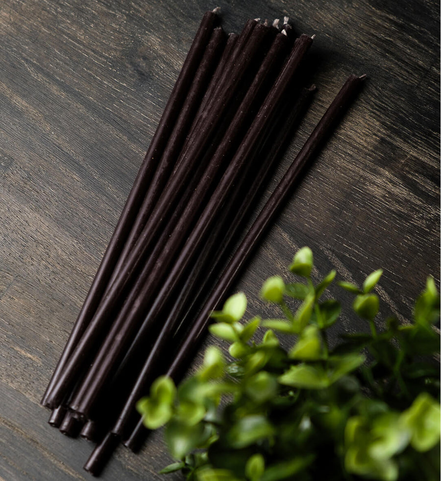 Black thin beeswax taper candles by Closterra