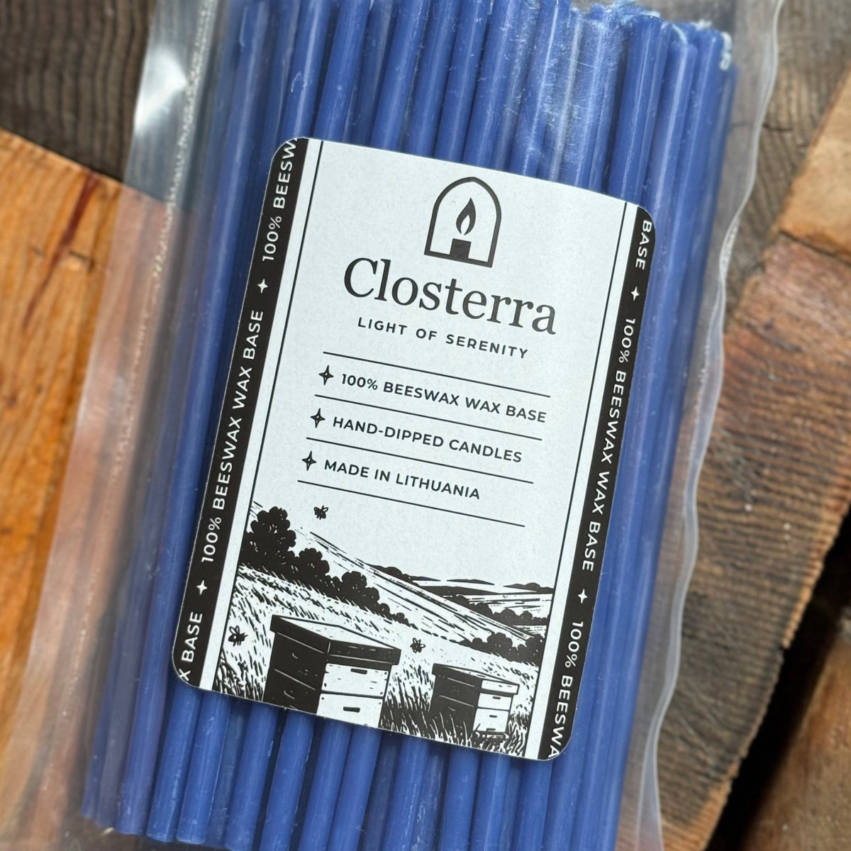 Blue beeswax taper candles 6.3″, closterra packaging closeup