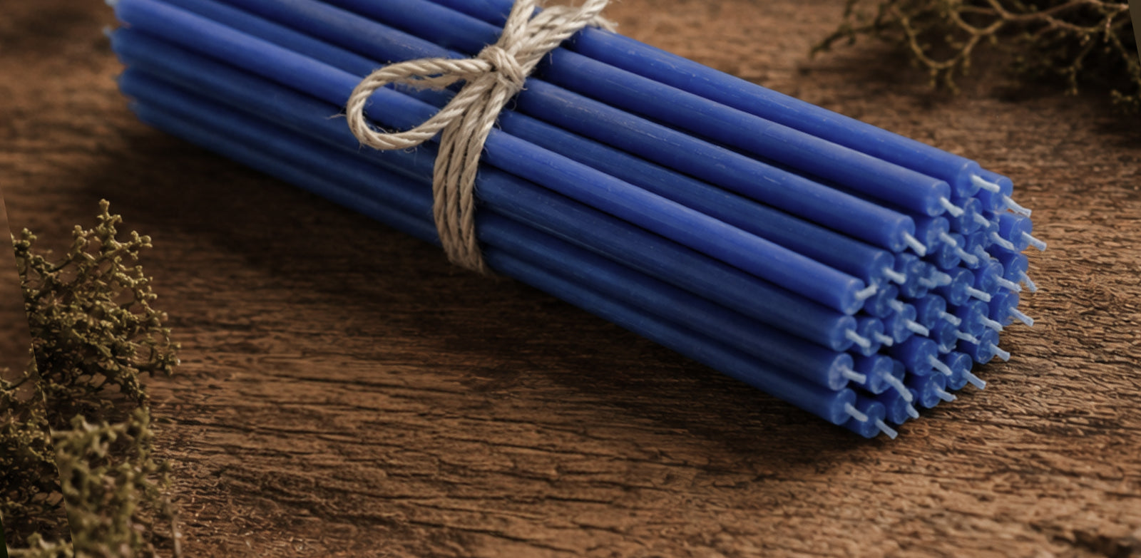 Blue beeswax taper candles by Closterra