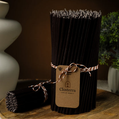 Black beeswax taper candles 6.3″, bundle with a Closterra tag beside a white vase