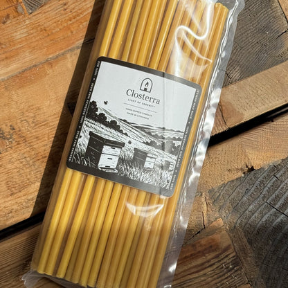 Natural yellow beeswax taper candles 10.4″, pack of 50 in Closterra packaging