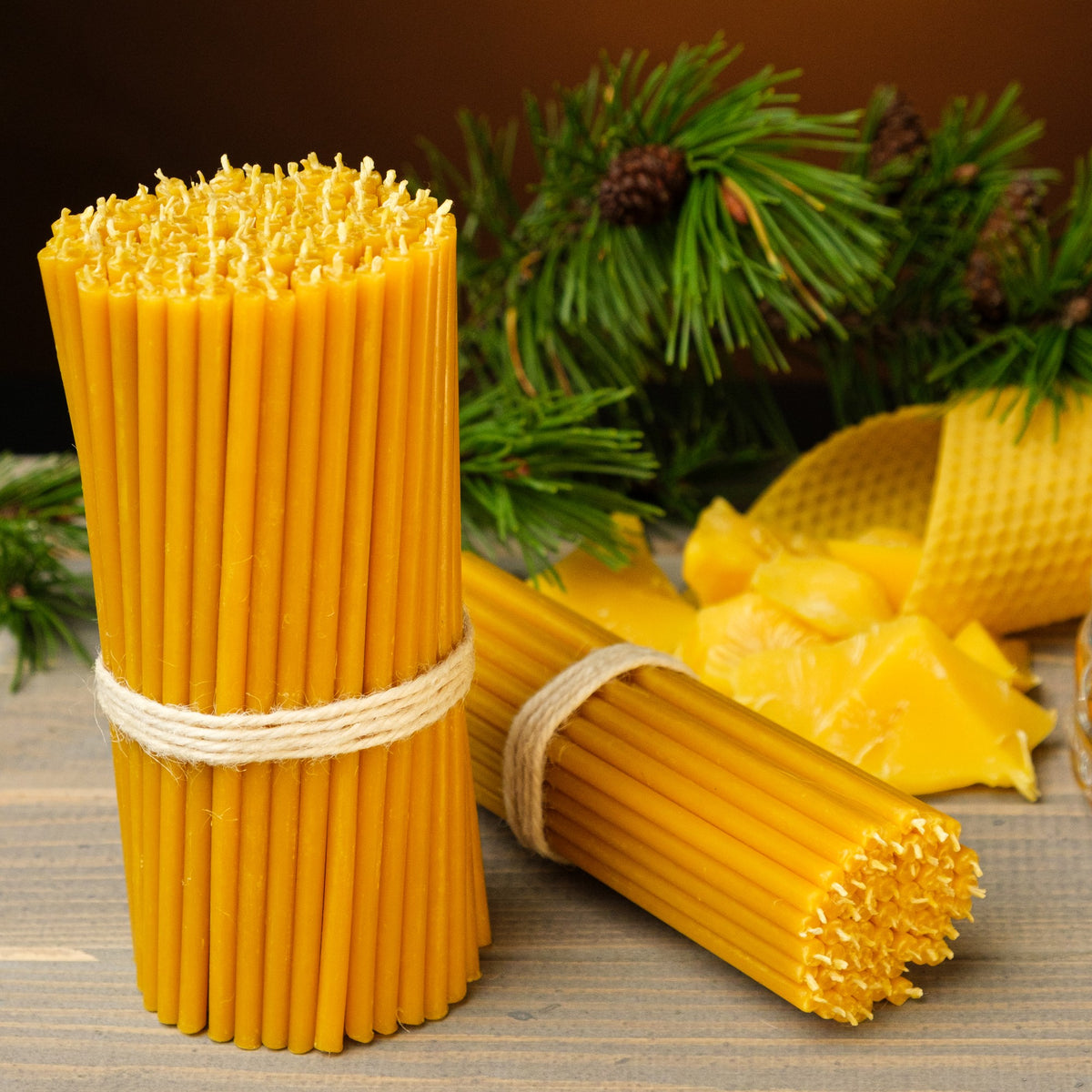 Natural yellow beeswax taper candles 10.4″, bundles with pine branches and honeycomb pieces