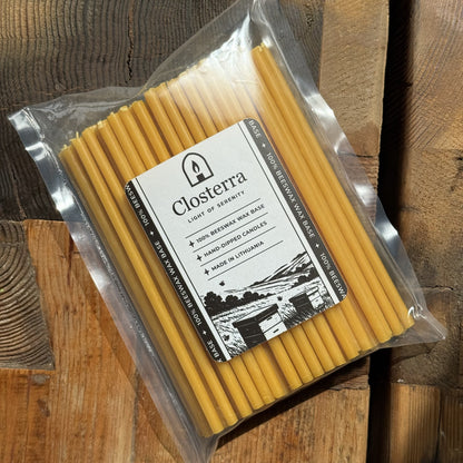 Natural yellow beeswax taper candles 6.5″, pack of 100 in Closterra packaging