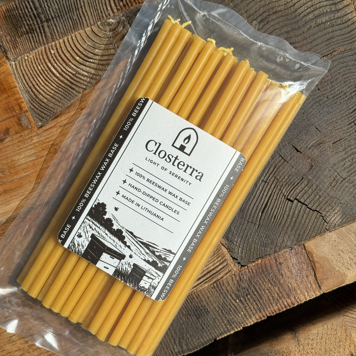 Natural yellow beeswax taper candles 7.3″, pack of 50 in Closterra packaging
