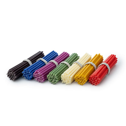 Closterra pure beeswax ritual candles in all seven colors: black, blue, purple, green, white, yellow and red