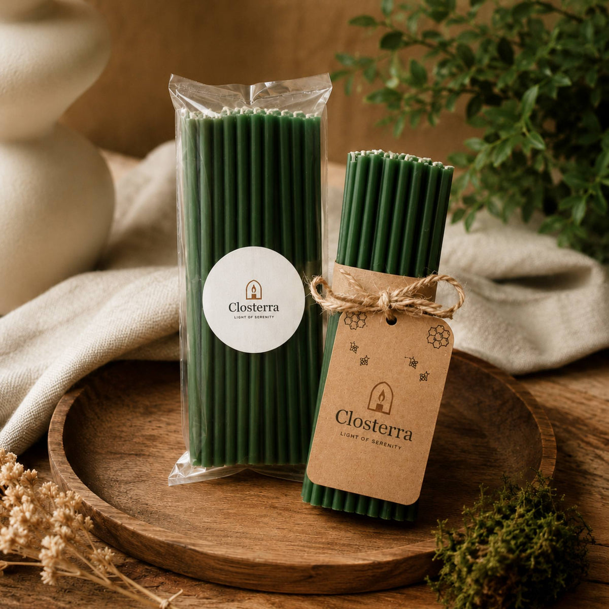 Closterra thin green beeswax taper candles, in Closterra packaging