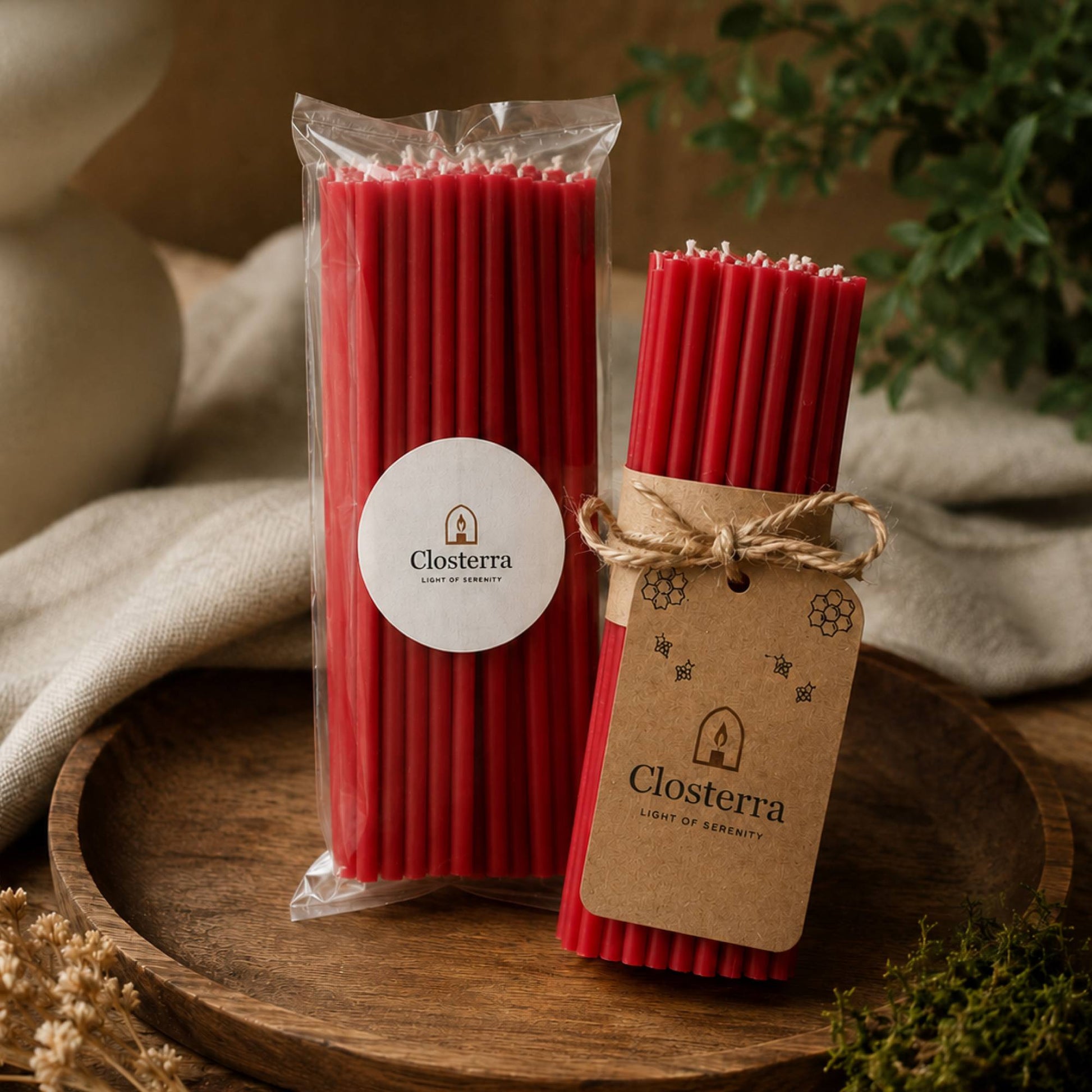 Closterra thin red beeswax taper candles, in Closterra packaging
