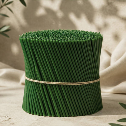 Closterra thin green beeswax taper candles, a bundle of tapers tied together