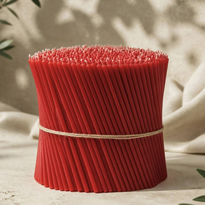 Closterra thin red beeswax taper candles, a bundle of tapers tied together