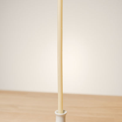 White beeswax taper candles 6.3″, single taper in a white holder