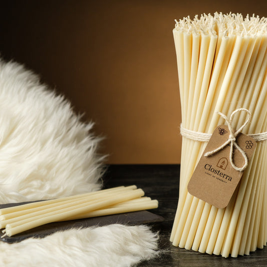 White beeswax taper candles 8″, bundle with a Closterra tag beside white faux fur