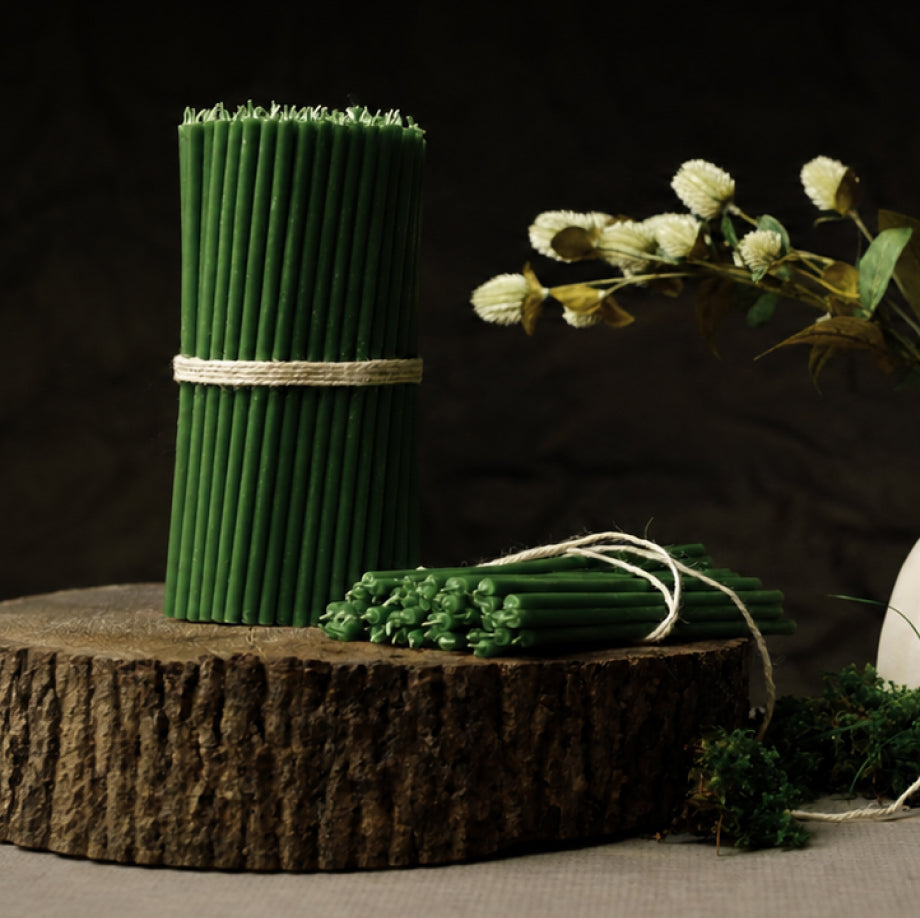 Green beeswax taper candles by Closterra
