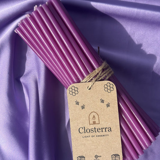 Purple beeswax taper candles 7.3″, bundle of 50 with Closterra tag on lilac satin