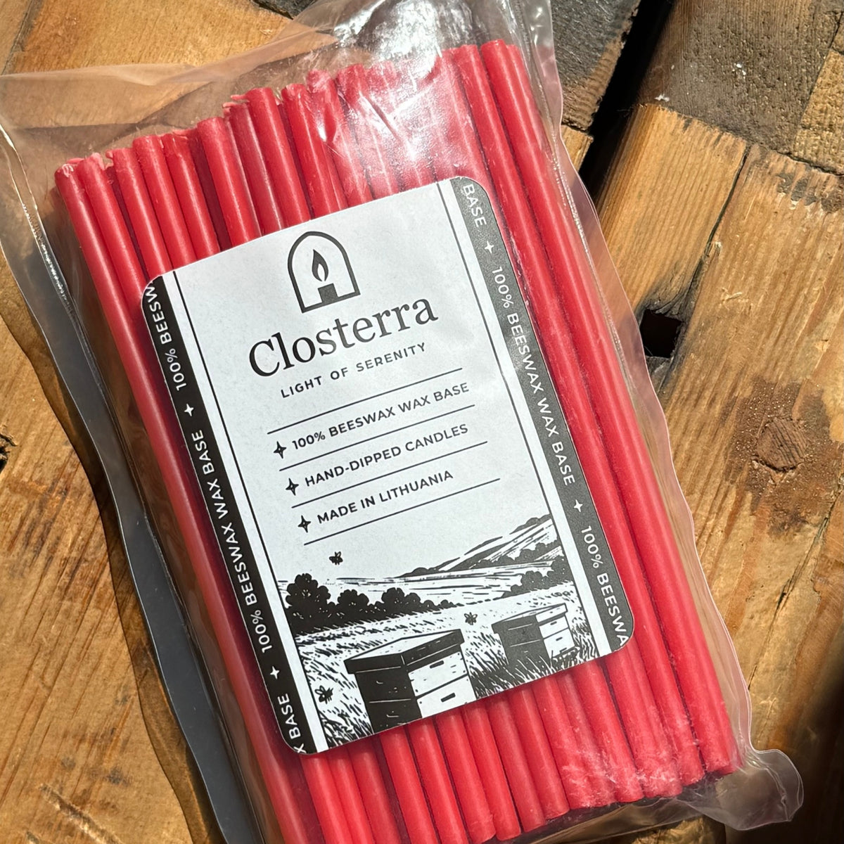 Red beeswax taper candles 6.3″, closeup single pack