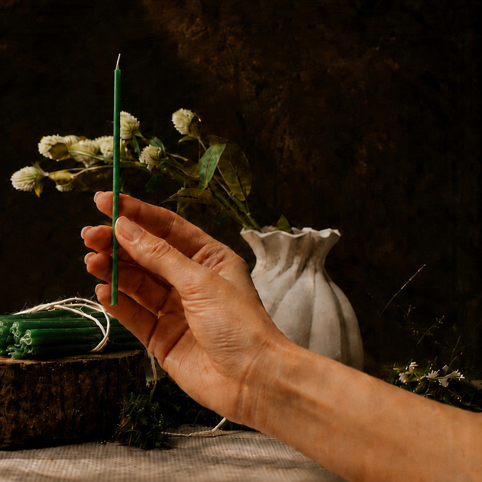 Green thin beeswax taper candle held in hand, 6.3 inch, Closterra