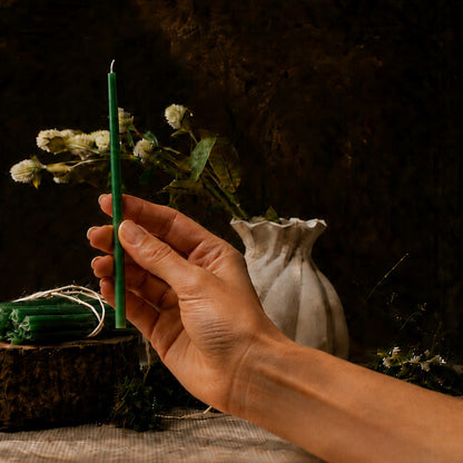 Green thin beeswax taper candle held in hand, 6.5 inch, Closterra