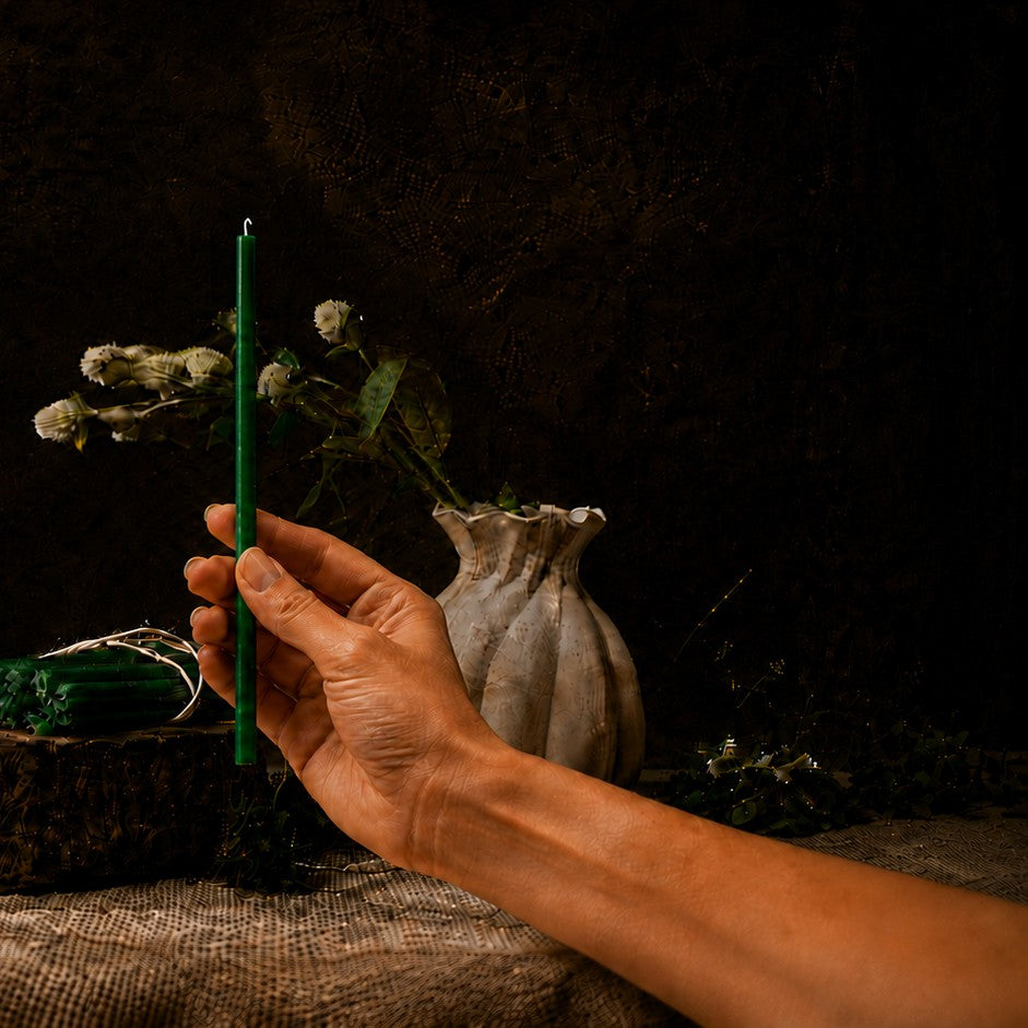 Green thin beeswax taper candle held in hand, 8 inch, Closterra