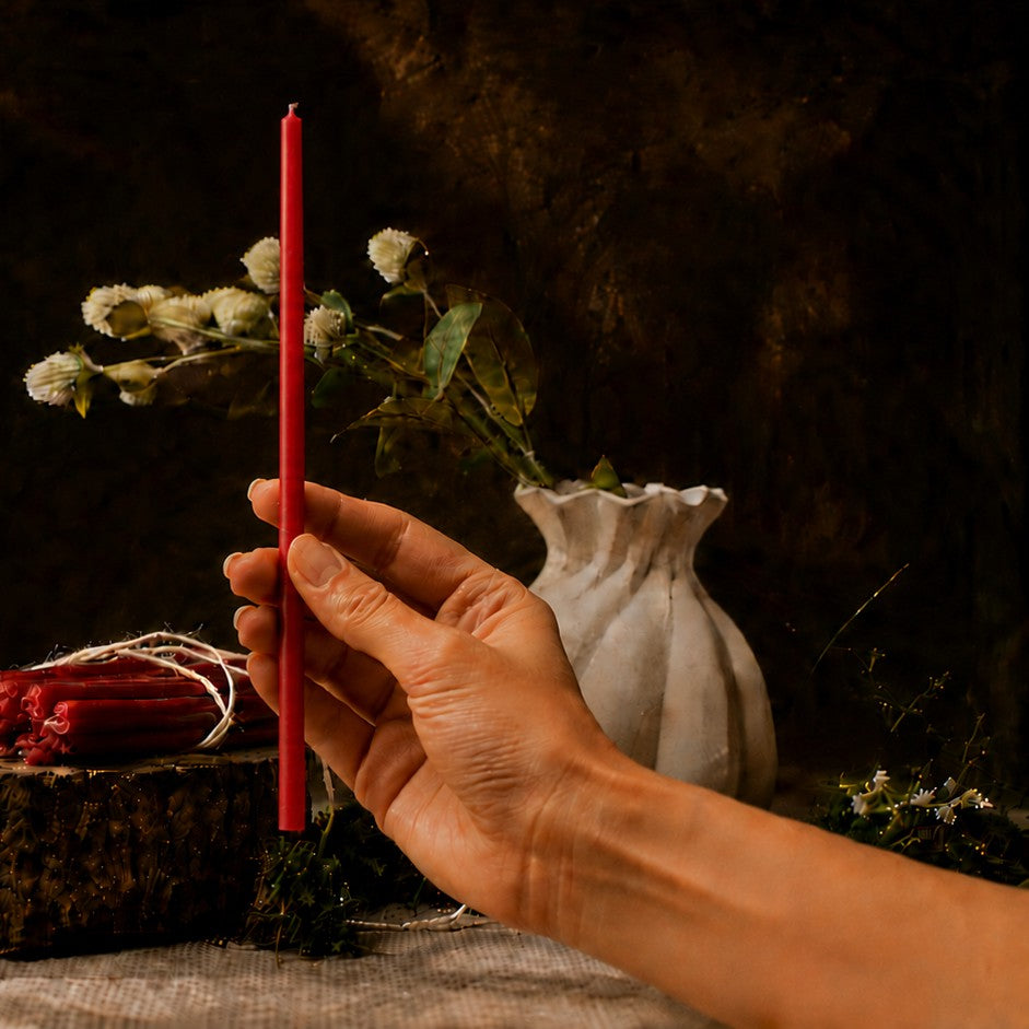 Red thin beeswax taper candle held in hand, 8 inch, Closterra