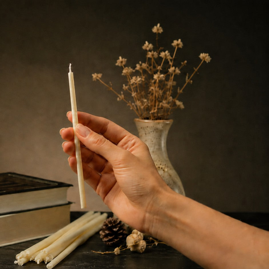 White thin beeswax taper candle held in hand, 6.3 inch, Closterra