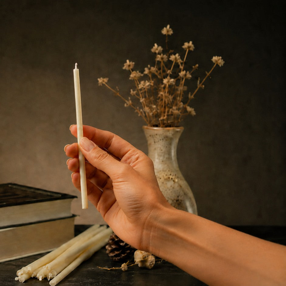 White thin beeswax taper candle held in hand, 6.5 inch, Closterra