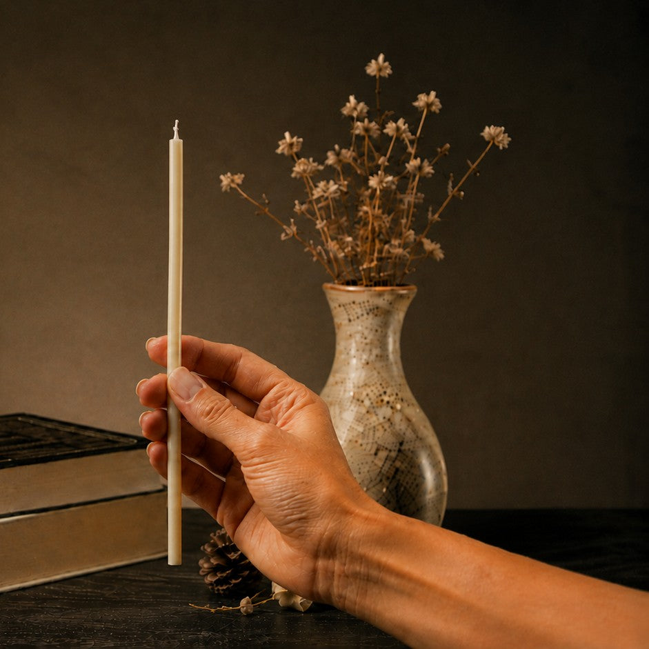 White thin beeswax taper candle held in hand, 8 inch, Closterra