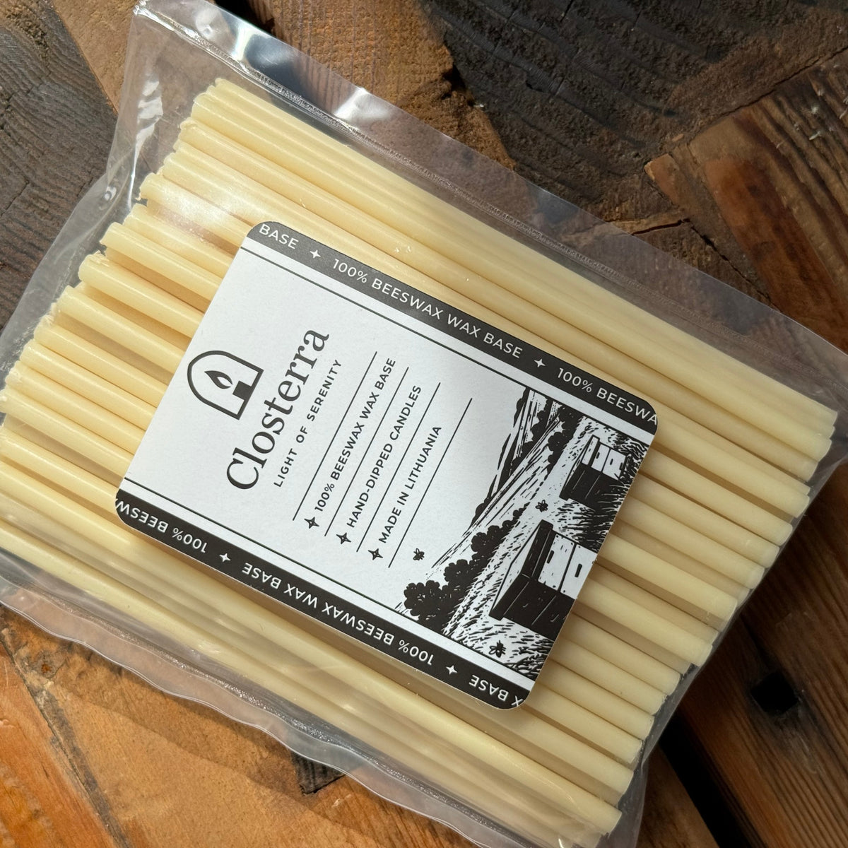 White beeswax taper candles 6.5″, in closterra packaging angled